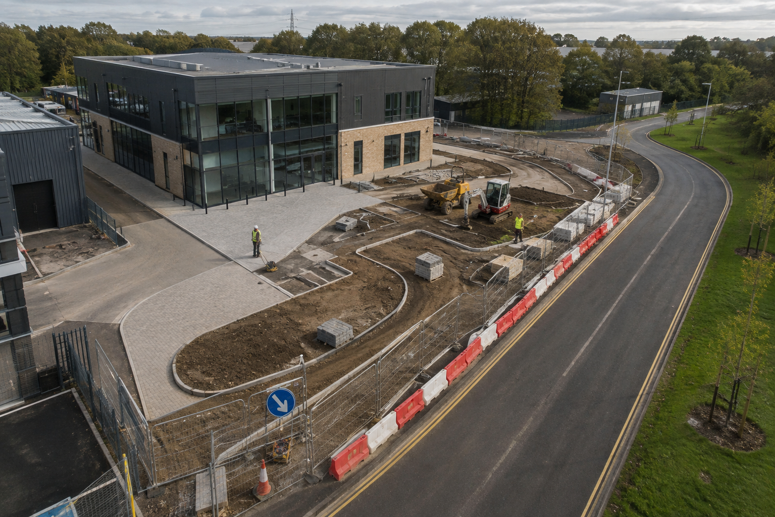 Newly completed commercial building with external works underway